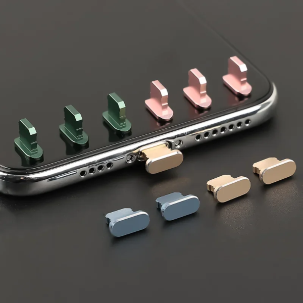 A phone with a Premium Aluminum Alloy Anti Dust Plugs case and different colored buttons on it.