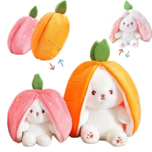 A collage of four images depicting plush toys that transform from fruits to rabbits. The top left shows a closed pink peach plush, and the top right shows it opened to reveal a white rabbit with pink inner ears and a peach-like hat. The bottom left shows a closed orange carrot plush, and the bottom right displays it opened to reveal a similar white rabbit with an orange carrot-like hat. Arrows indicate the transformation sequence.